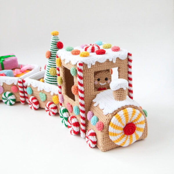Complete candy train crochet kit supplies on wooden table