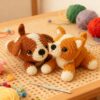Complete 2 tiny dog crochet plush kit supplies on wooden table