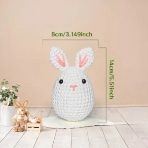 Complete white rabbit crochet plush kit supplies on wooden table