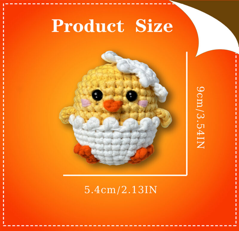 Small crochet chick plush placed on a modern office desk