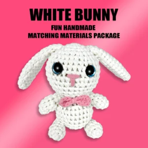 Complete tiny white bunny crochet plush kit supplies on wooden table