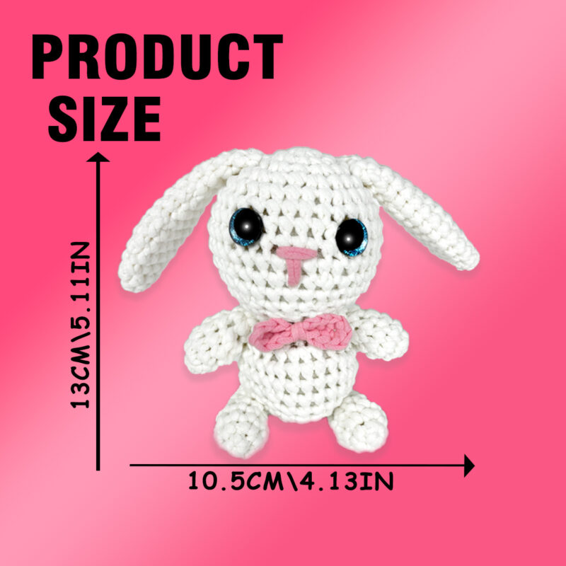 Complete tiny white bunny crochet plush kit supplies on wooden table