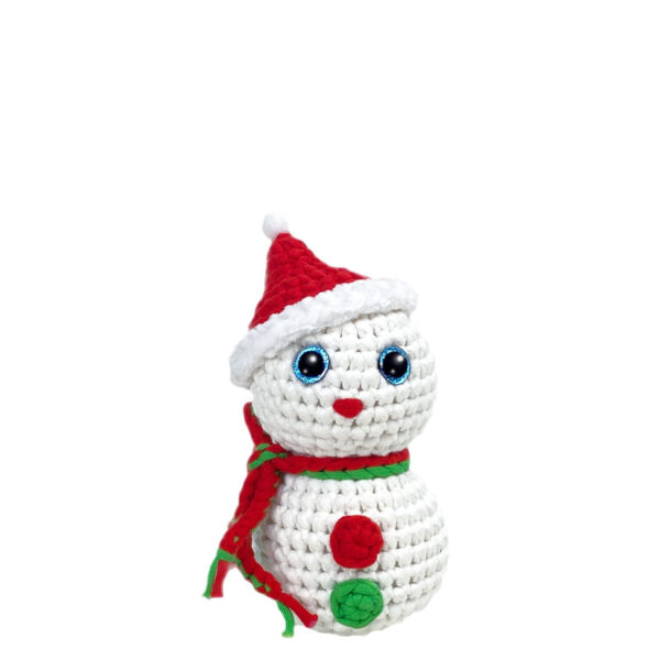 Finished handmade christmas snowman crochet plush displayed on mantel