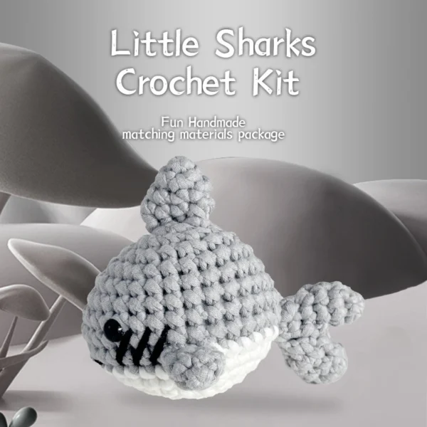 gray shark crochet kit Complete gray shark crochet plush kit supplies on wooden table