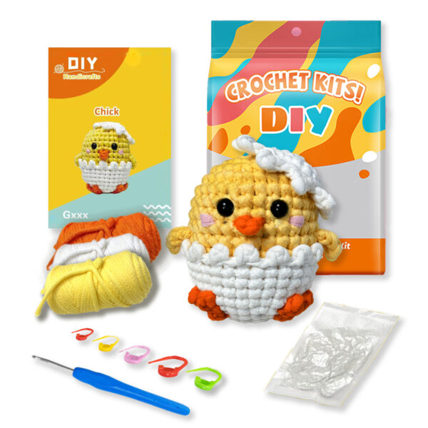 Finished handmade tiny chick crochet plush displayed on shelf