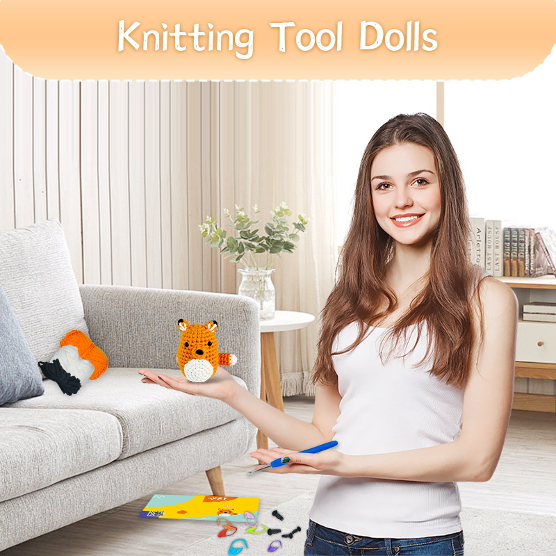 Orange Fox Crochet Plush Kit for Beginners 5 Small crochet orange fox plush placed on a modern office desk