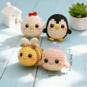 Complete 4 mini animal crochet decor kit supplies on wooden table