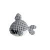 Small crochet gray shark plush placed on a modern office desk
