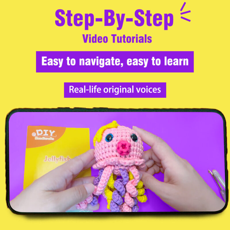 Finished handmade pink octopus crochet plush displayed on shelf