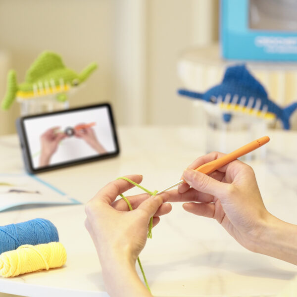 Finished handmade blue sailfish crochet plush displayed on coastal home shelf