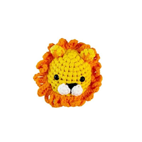 small crochet animal Finished handmade lion crochet plush displayed on shelf