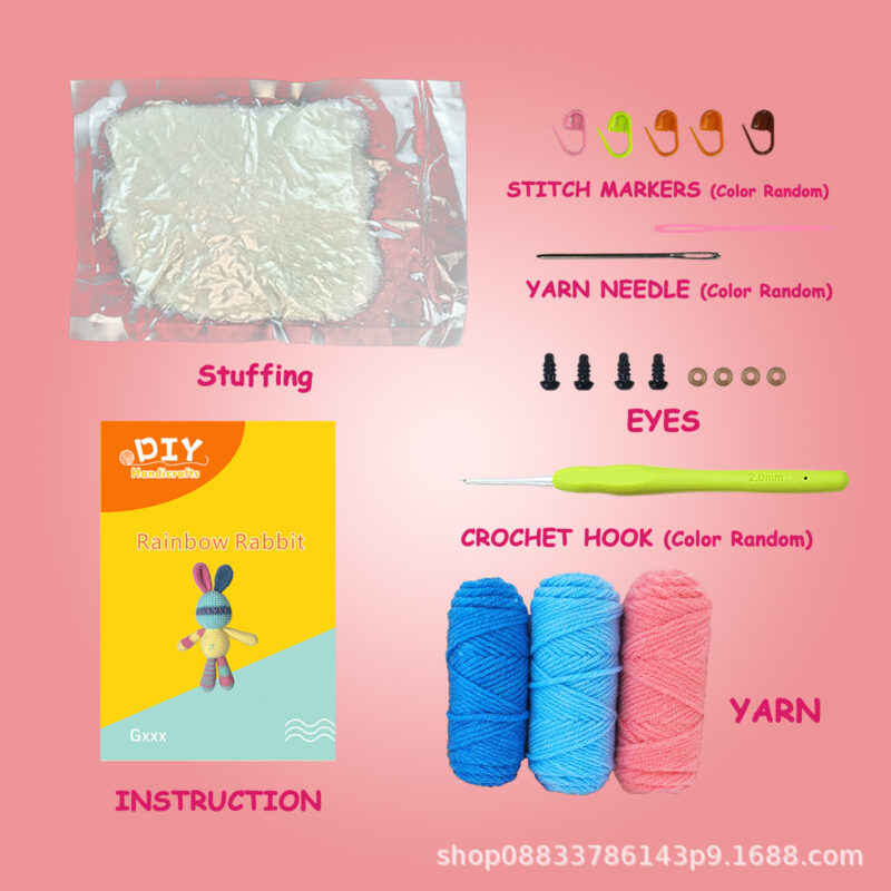 Finished handmade gray bunny with carrot crochet plush displayed on shelf