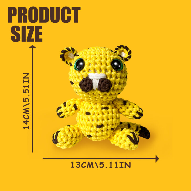 Complete leopard crochet plush kit supplies on wooden table