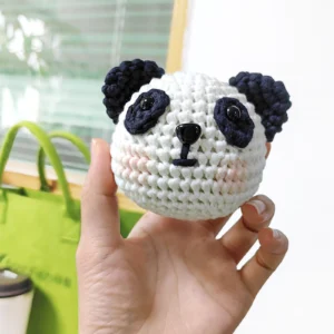 Pre-portioned black and white yarn for panda crochet kit