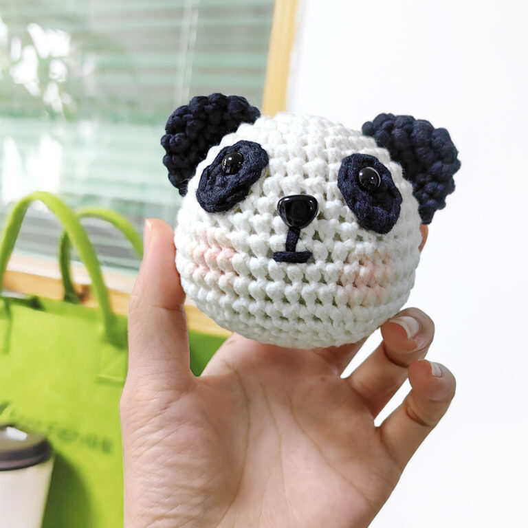 Pre-portioned black and white yarn for panda crochet kit