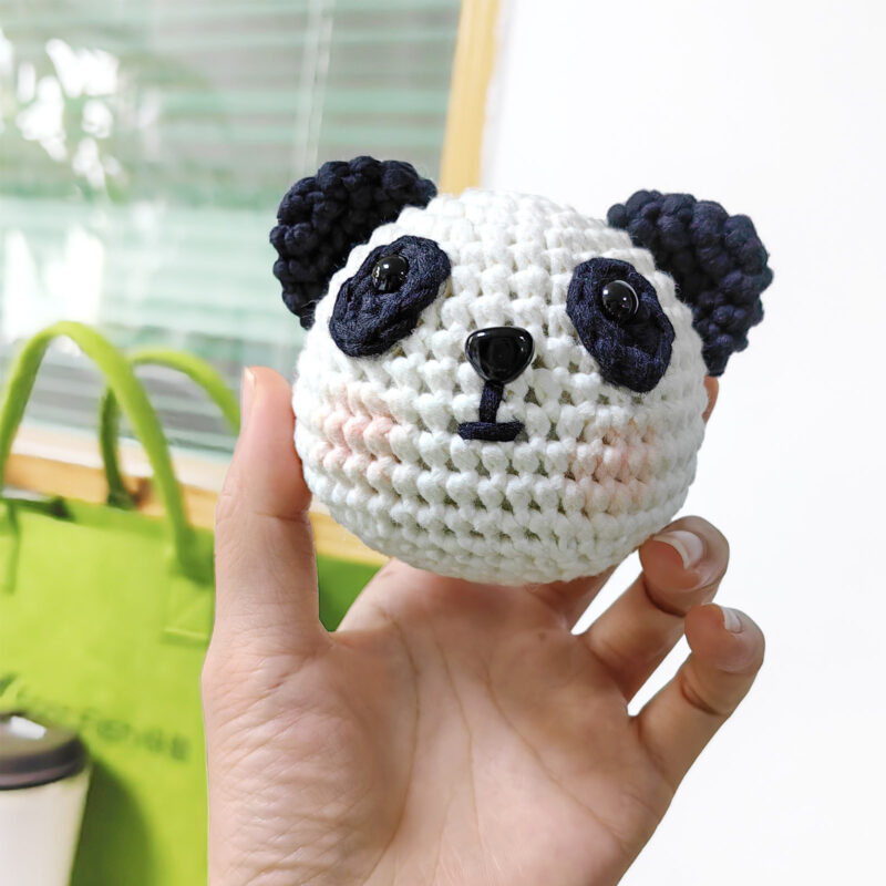 Pre-portioned black and white yarn for panda crochet kit